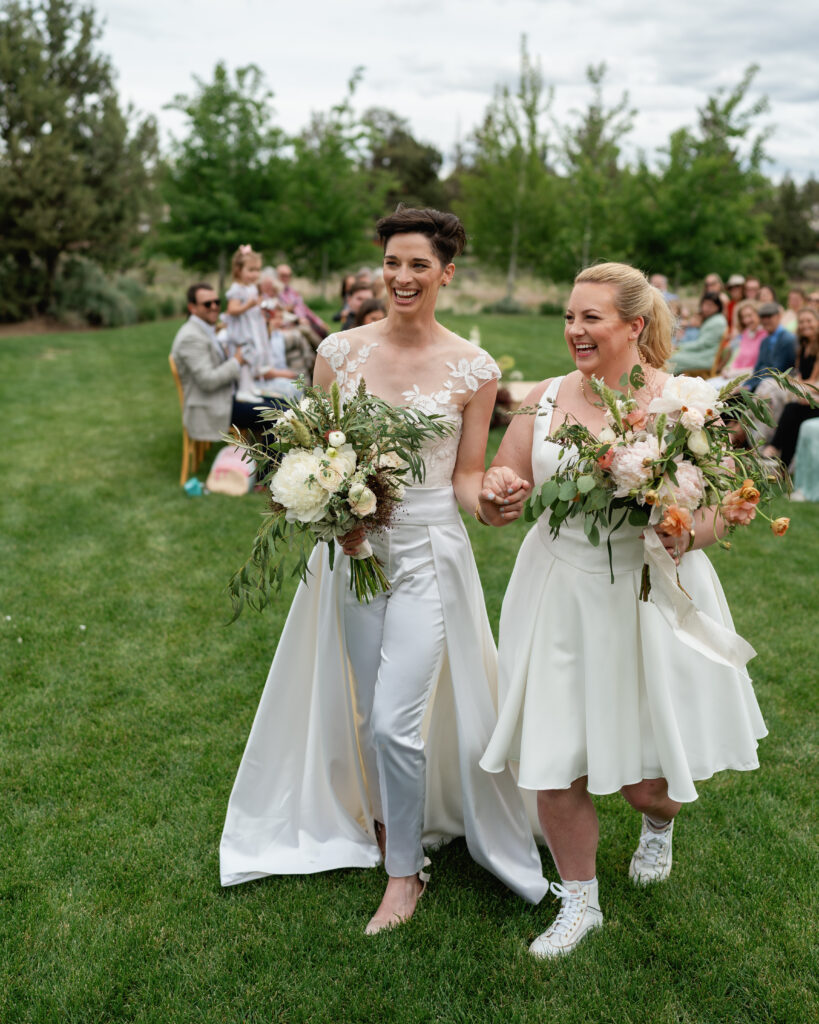 LGBTQ luxury micro-wedding in Bend Oregon at Hanai Center. This couple decided on having both rather than choosing between an elopement vs micro wedding. 