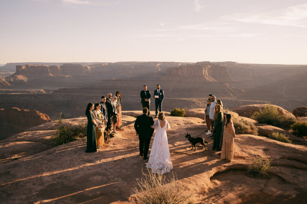 Couple compared an elopement vs micro wedding and chose a sunset desert micro wedding in Moab Utah