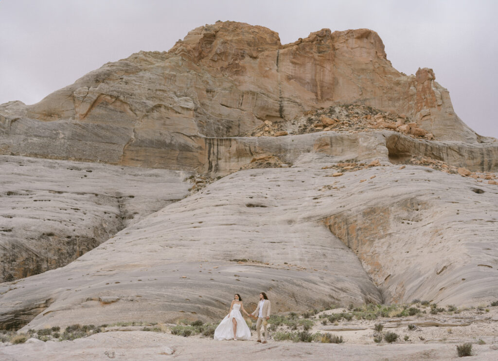 Couple in the desert of Amangiri on their luxury elopement day. 