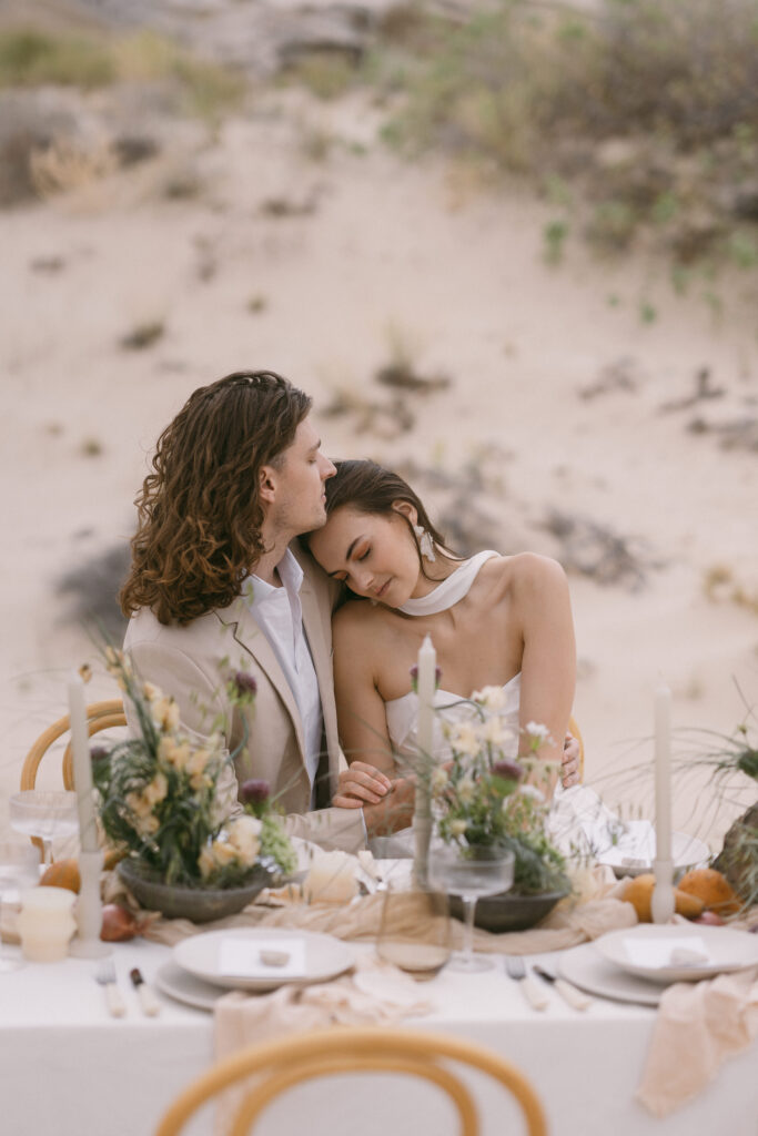 Couple enjoying their reception dinner following their luxury elopement. 