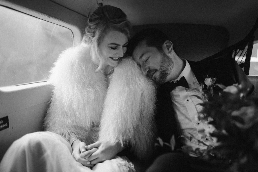 A couple enjoying a stress-free wedding day while flying in a Kenmore Air seaplane from Orcas Island Washington onto Ross Lake in the North Cascades National Park.