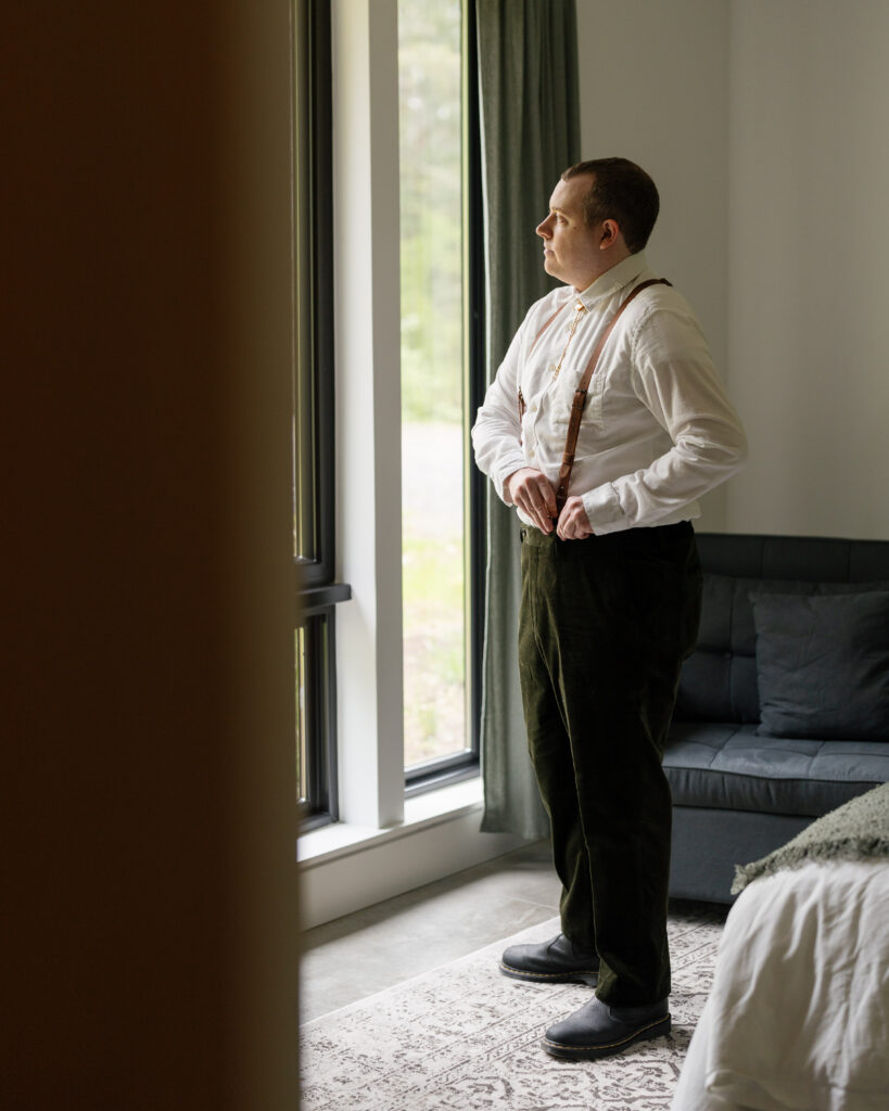 groom getting ready on his elopement day