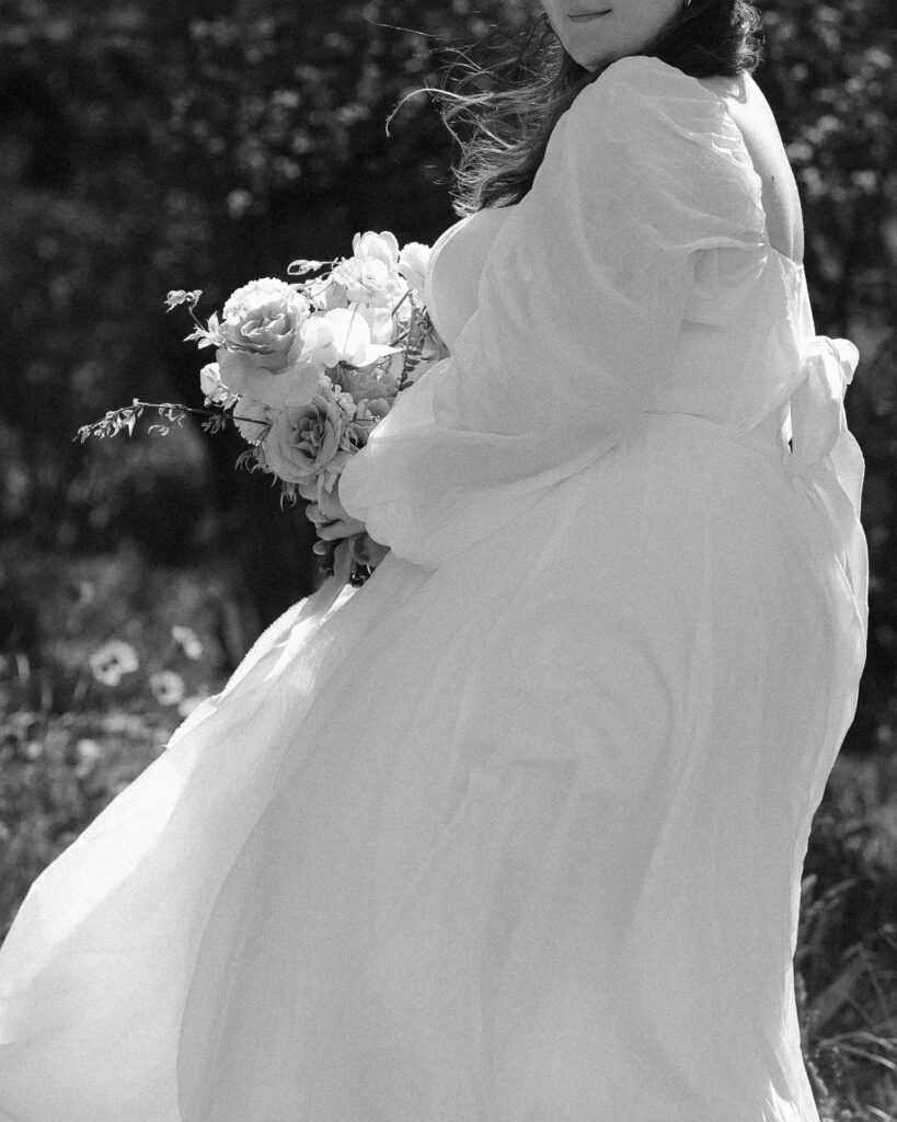 black and white portrait of plus size bride on her elopement